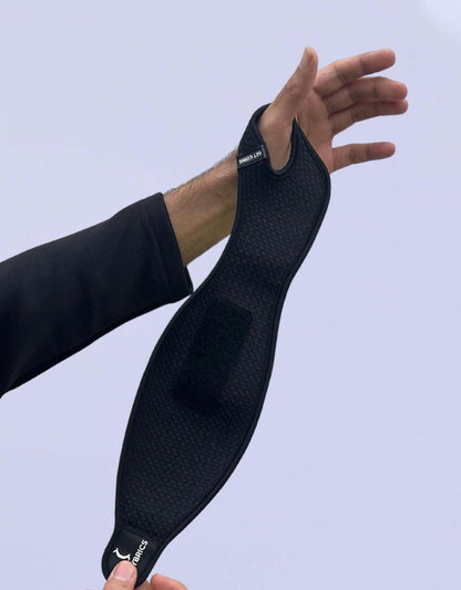 Bodybrics black wrist wrap brace, long strap with hook-and-loop closure