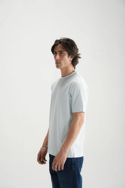 Blue crew-neck T-shirt profile view, short sleeves and crew neckline