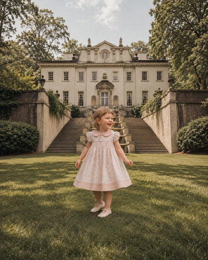 Licci cream floral toddler dress, short puff sleeves and gathered skirt