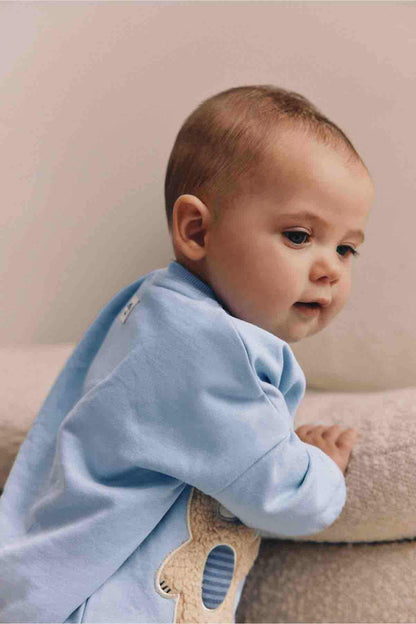 Light blue baby sweatshirt with teddy bear applique detail and long sleeves