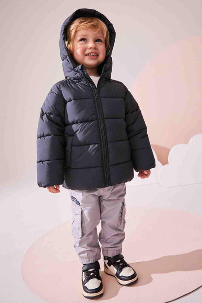 Kids charcoal puffer jacket with hood, front zip, and gray pants