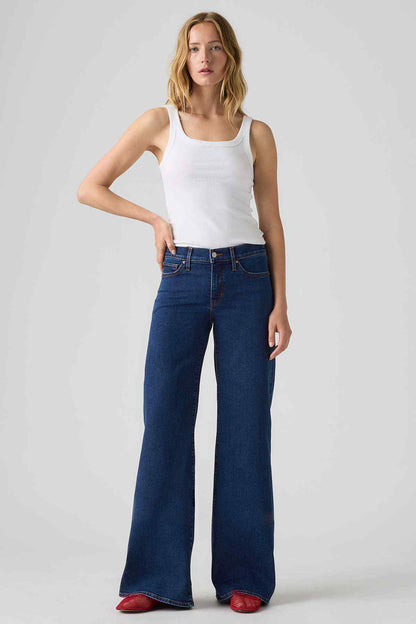Women’s wide-leg jeans, medium indigo wash with five-pocket styling and belt loops