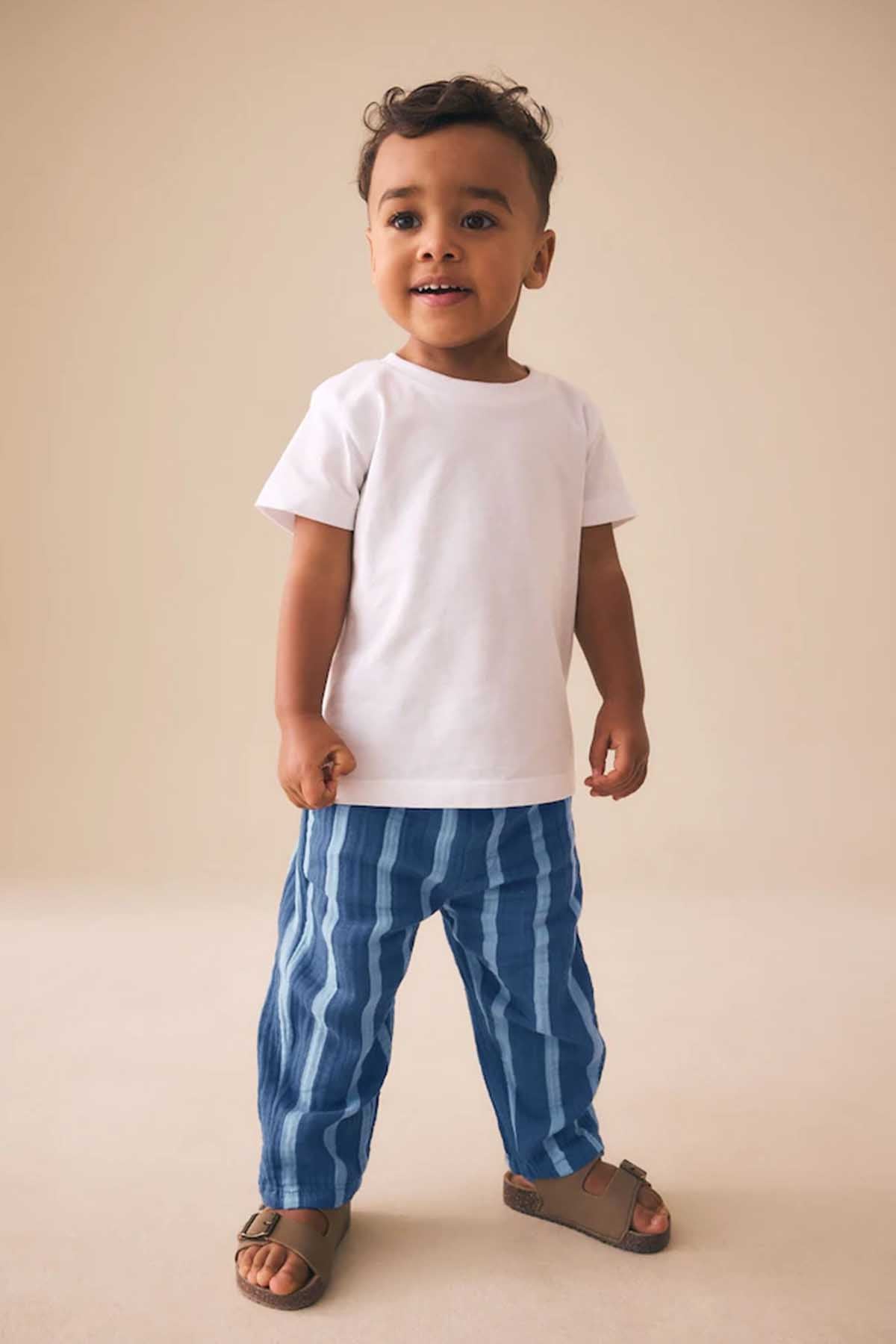 Kids outfit with white T-shirt and blue vertical striped pants