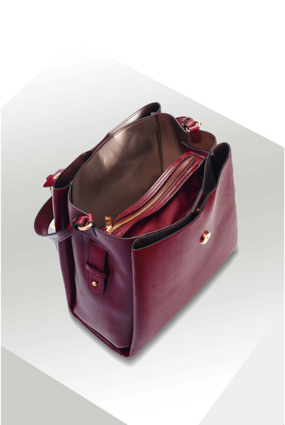 Berry leather tote bag open top showing brown fabric lining and side hardware