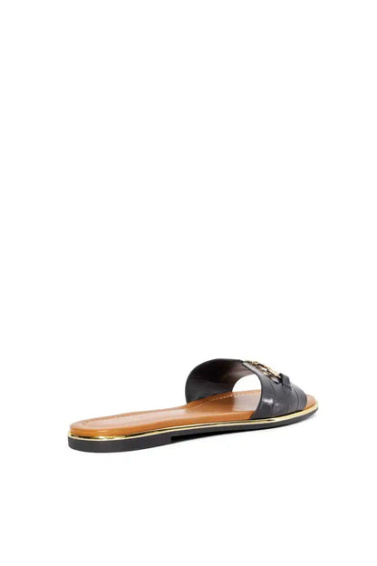 Dune London black slide sandals with gold buckle straps, open toe