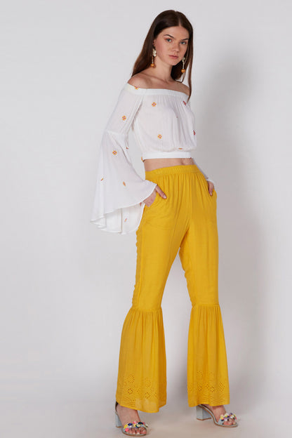 White off-shoulder embroidered blouse with flared sleeves, cropped fit