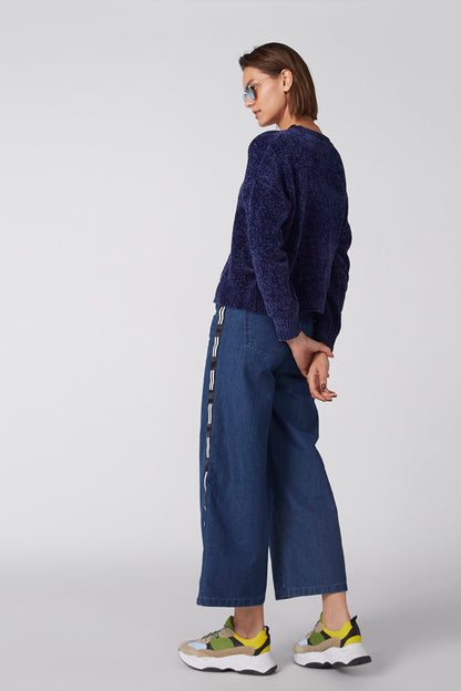 Blue knit sweater back view, crew neck, long sleeves with ribbed cuffs