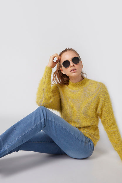 Yellow fuzzy knit sweater with round neck and long sleeves
