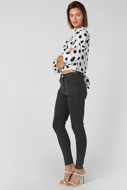 White polka-dot cropped tie-waist blouse with puff sleeves