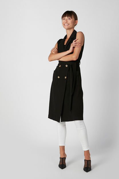 Black sleeveless double-breasted vest with lapels, gold buttons, wrap tie belt