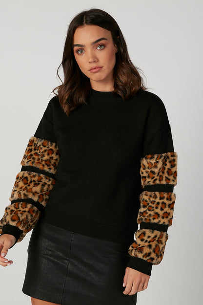 Black sweatshirt with leopard-print sleeve panels and ribbed neckline
