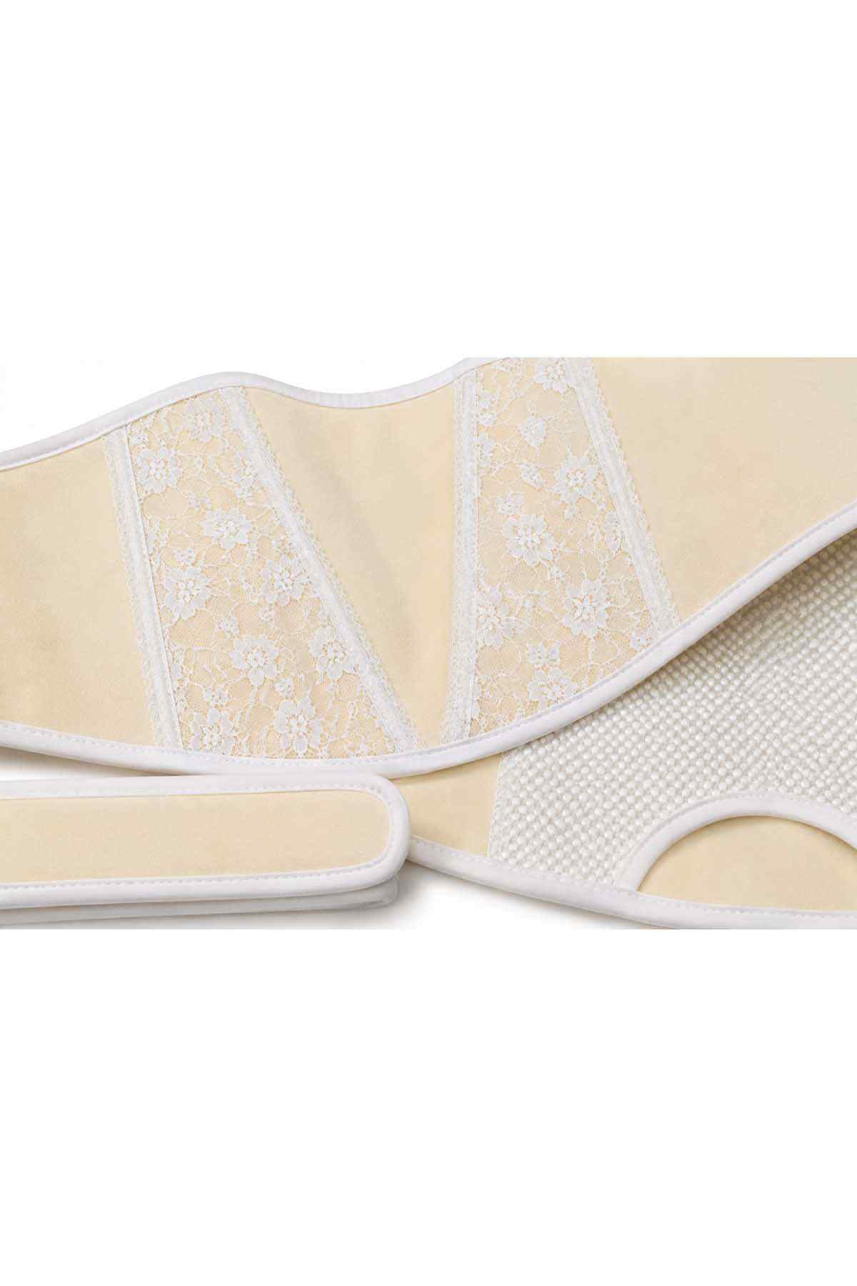 Cream support belt with embroidered lace stripes and textured side mesh.