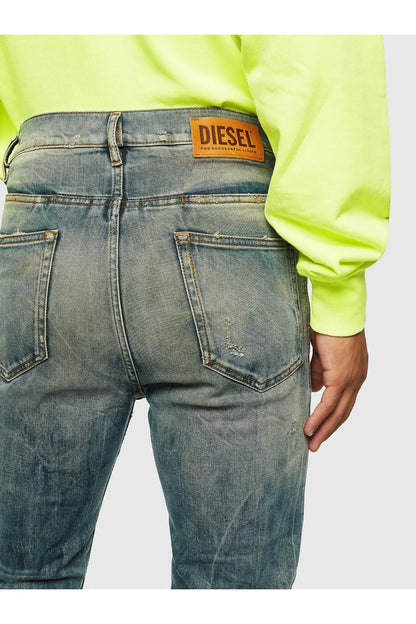 Indigo Diesel jeans with DIESEL patch, button fly, front pockets, belt loops