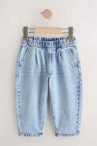 Light blue denim toddler jeans with elastic waist and cuffed pant legs