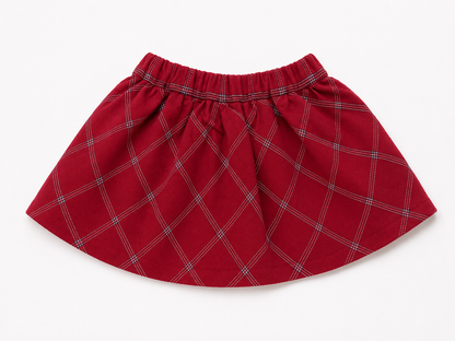Red plaid baby skirt with gathered waistband and flared hem