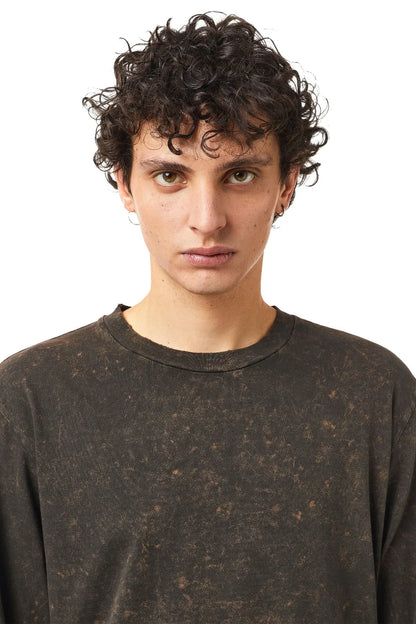 Dark brown speckled crewneck long-sleeve shirt neckline close-up