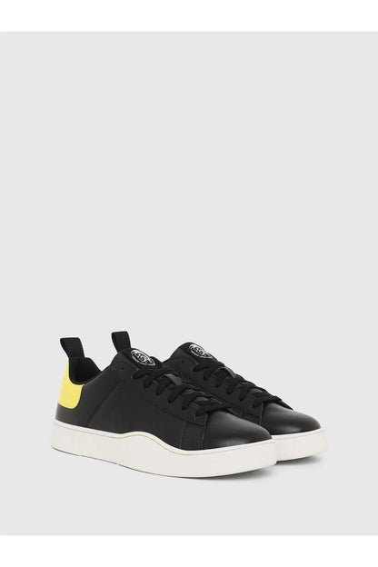 Diesel black lace-up sneakers with yellow side panel and white midsole