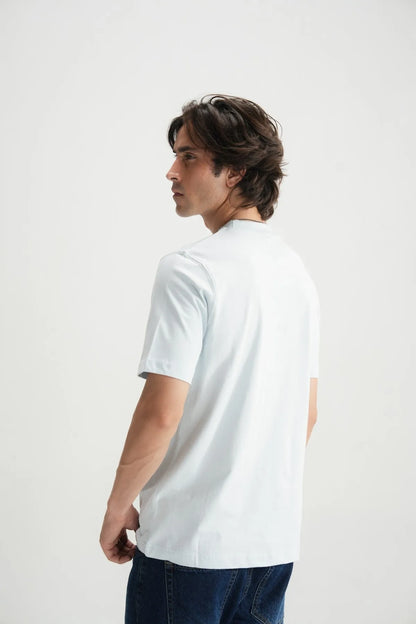 Light blue crew-neck short-sleeve T-shirt on model, side view