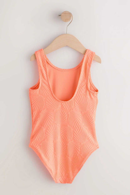 Orange one-piece swimsuit, scoop neck, textured leaf pattern