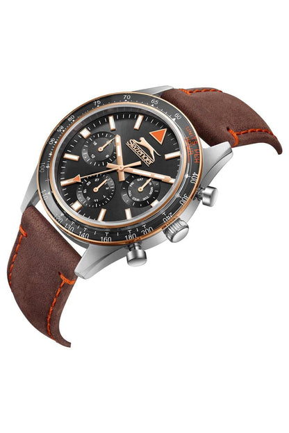 Brown leather-strap wristwatch, angled view with dark dial, gold-tone markers, and subdials