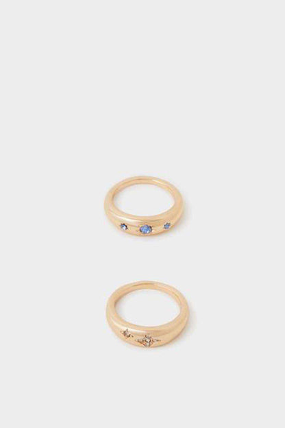 Gold-tone rings with blue and clear stones, set of three
