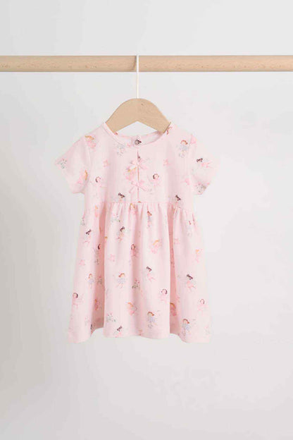 Pink kids dress with short sleeves, gathered waist, and allover cute prints