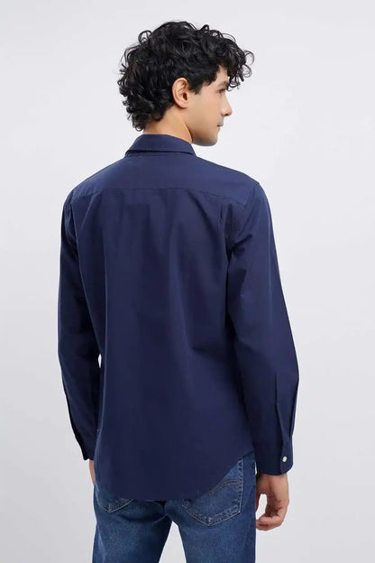 Men's navy button-up shirt back view with long sleeves and curved hem