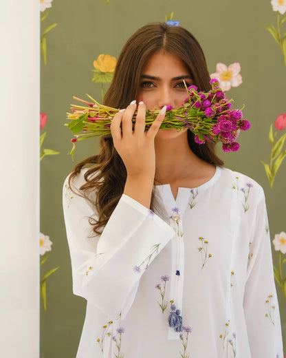 White floral kurta top with three-quarter sleeves and round neckline