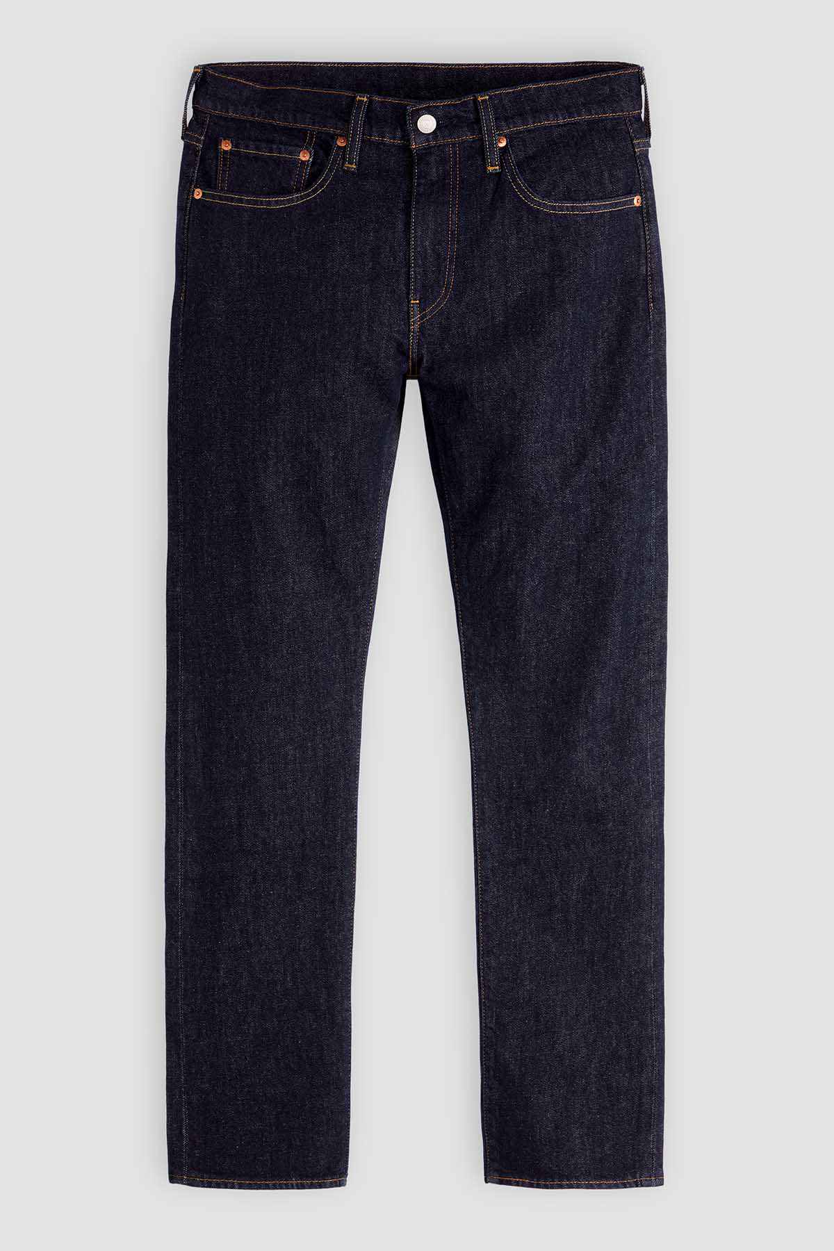 Levi's dark denim jeans with button fly, five-pocket design, straight leg