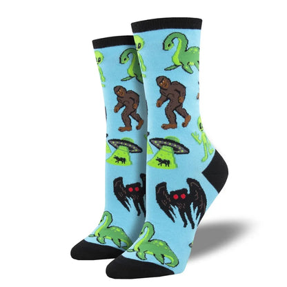 Light blue crew socks with black toe, featuring bears, frogs, and alien scenes