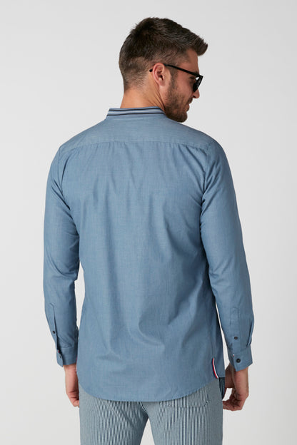 Men's blue button-up shirt from back view, long sleeves and buttoned cuffs