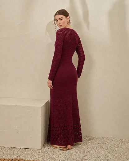 Maroon long-sleeve knitted maxi dress with V-neck and flared lace-like hem