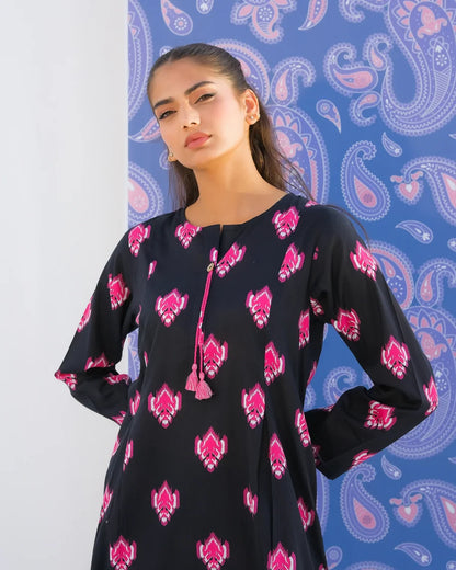 Black kurta close-up with round neckline and pink printed motifs on long sleeves
