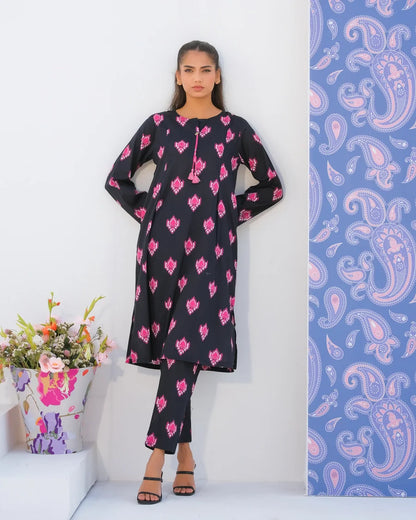 Black printed long kurta and straight pants set with pink motifs, front view