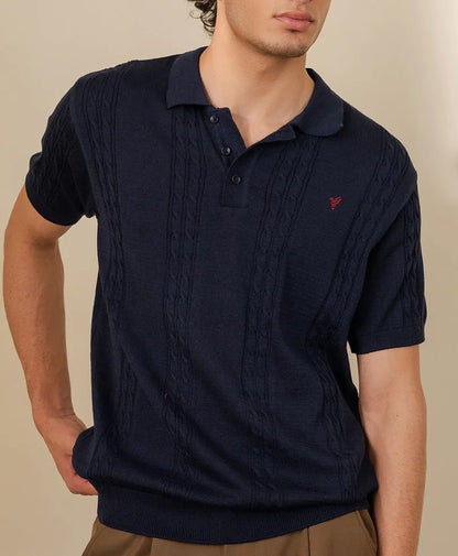 Fitted knit polo shirt front, navy blue knit texture, short sleeves, red logo