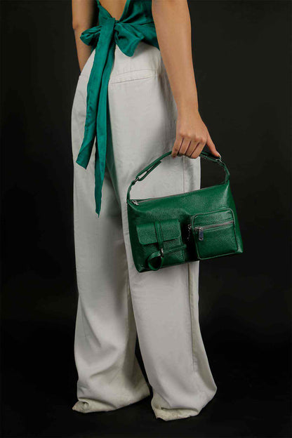 Emerald green leather-look handbag with top handle, front flap, small zip pocket