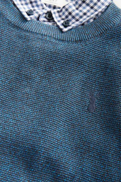 Navy textured knit sweater detail with checked collar and small button