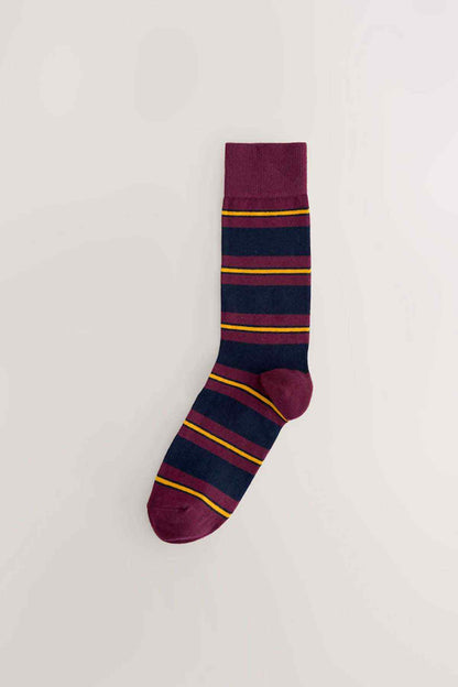 Burgundy crew sock with navy stripes and yellow-orange horizontal bands