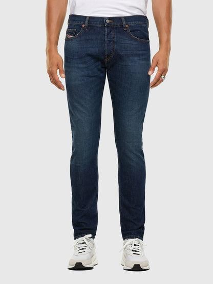 Men's blue denim jeans with straight fit, button fly and belt loops