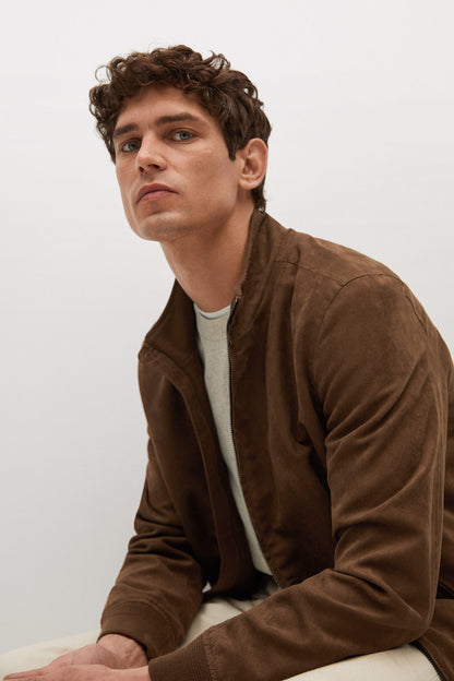Cognac-brown zip-front suede jacket with stand collar and side pockets