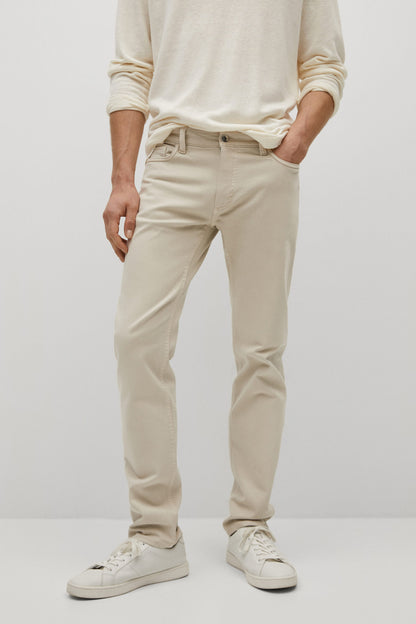 Beige denim jeans with belt loops and front button closure
