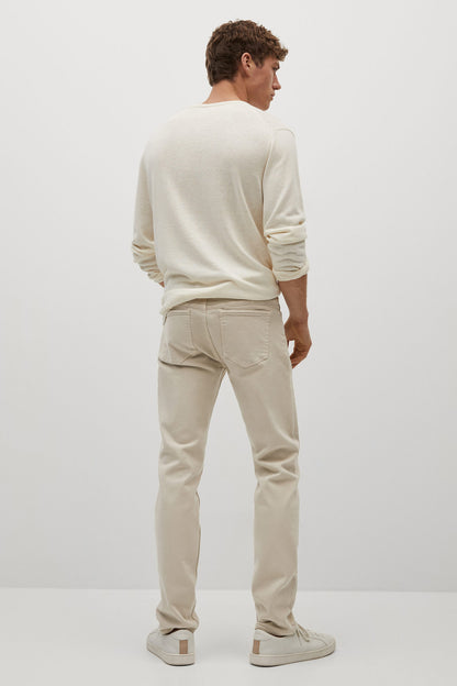 Beige denim jeans, back view, with belt loops and back pockets