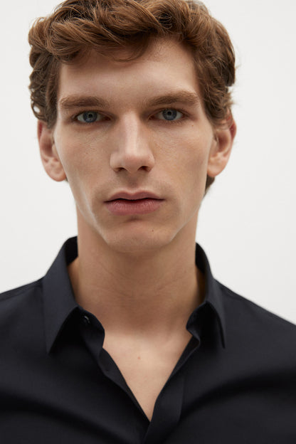 Men's black button-up shirt with pointed collar