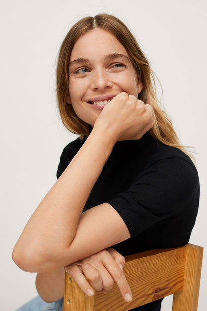 Black short-sleeve fitted turtleneck top, front view