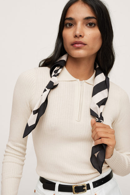 Ecru ribbed knit quarter-zip top with stand collar