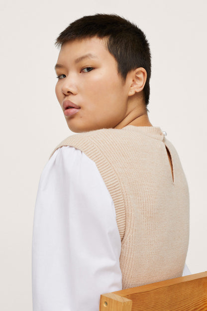 Sleeveless knit vest in light beige, crew neck, ribbed trim, side view