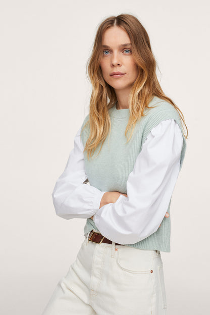 Aqua green ribbed knit sleeveless vest with crew neck, styled over white shirt
