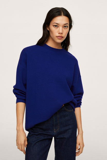 Blue crewneck sweatshirt with dropped shoulders, elbow-length sleeves, and ribbed hem