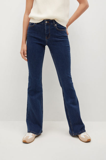Dark blue denim jeans with straight legs and stitched seams