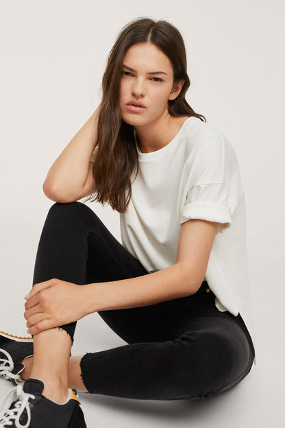 Black denim cropped jeans with ankle-length cuff and slim fit